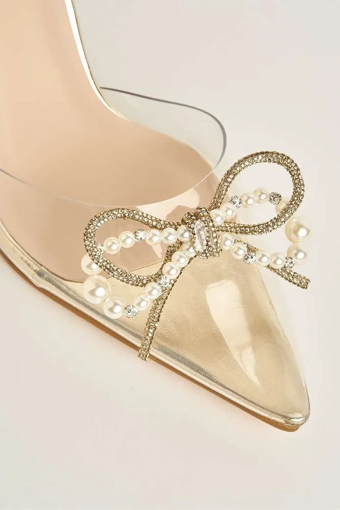 Orkide Diamante Bow and Pearl Detail Perspex Court Shoes in Gold